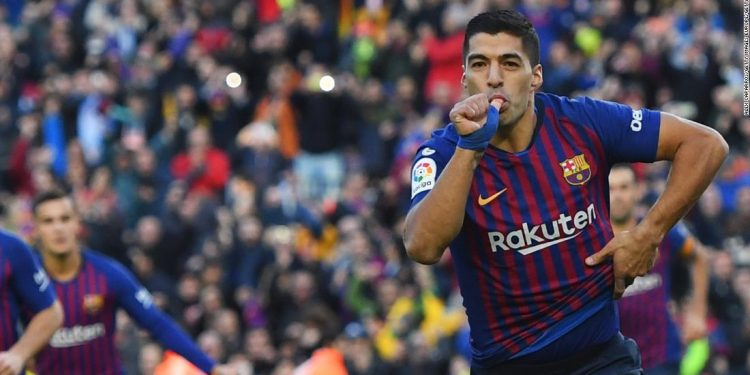 Suarez bites Real Madrid