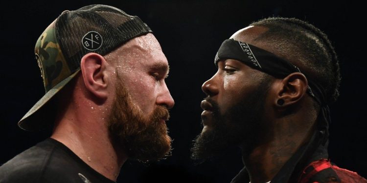 Tyson Fury weighs in three stone heavier than Deontay Wilder