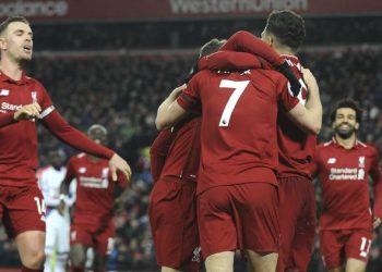 Liverpool maintain title pace with comeback win over Palace
