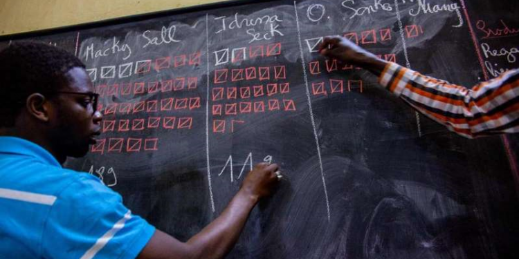 Senegal president’s camp claims election win, opposition objects