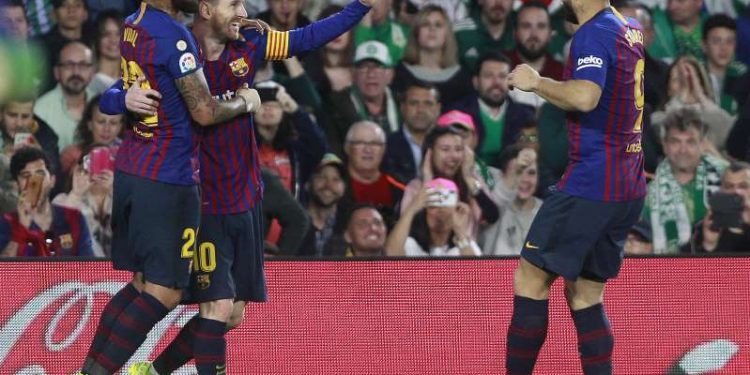 Rival fans cheer as brilliant Messi scores 3 for Barcelona