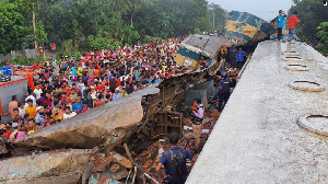 At least 12 dead after two trains collide in Bangladesh