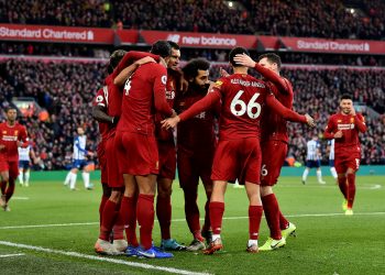Liverpool go 11 points clear with win despite Allison’s red card
