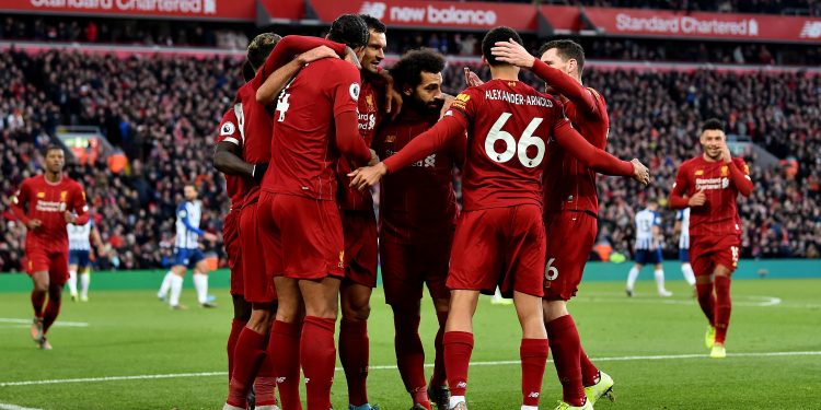 Liverpool go 11 points clear with win despite Allison’s red card