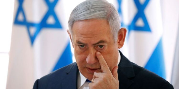 Israel PM charged with corruption