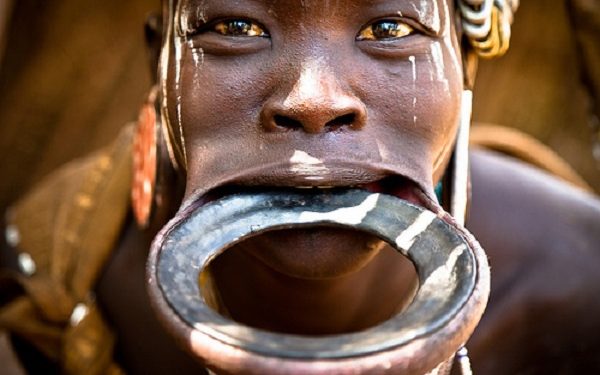 The mysterious history and meanings of African tribal lip plates and why women wear them
