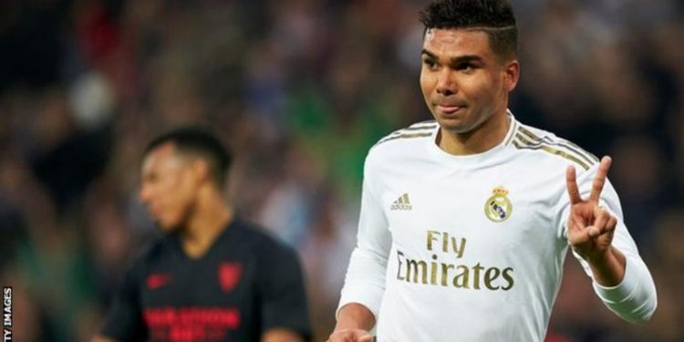 Real Madrid beat Sevilla to go top of La Liga