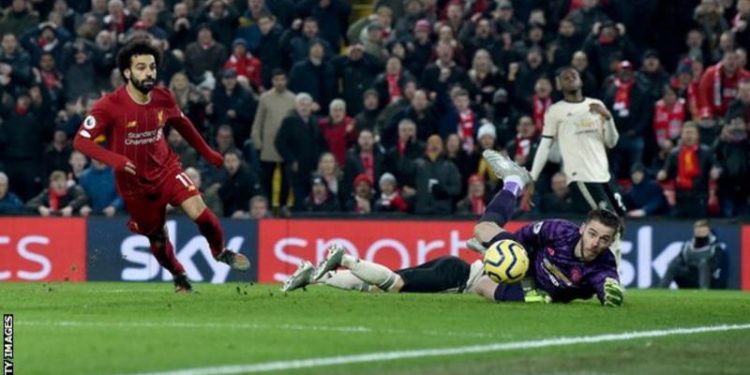 Van Dijk and Salah send Liverpool 16 points clear at top with win over Man Utd