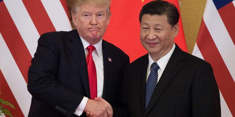 US and China sign deal to ease trade war