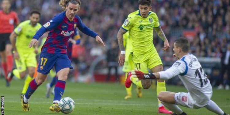 Barca gain narrow in over Getafe