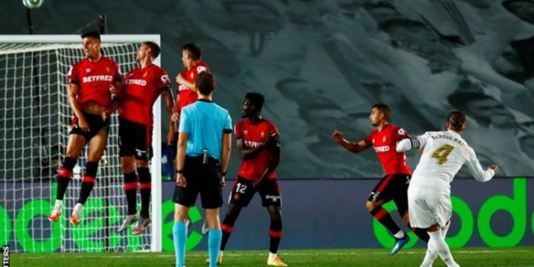 Real Madrid go top of La Liga as Mallorca give 15-year-old debut