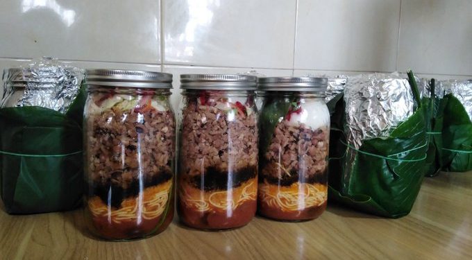 Reggie Rockstone clarifies why he packages waakye in glass jars for sale