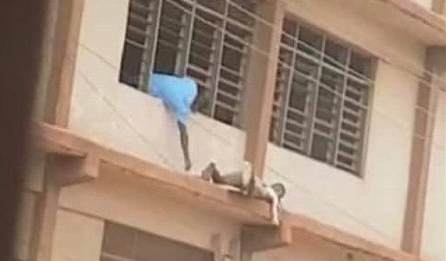 ‘Spiderman’ sneaks WASSCE answers to students on top floor with ladder