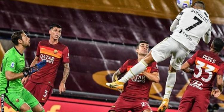 Ronaldo’s brace helps 10-man Juventus draw at Roma