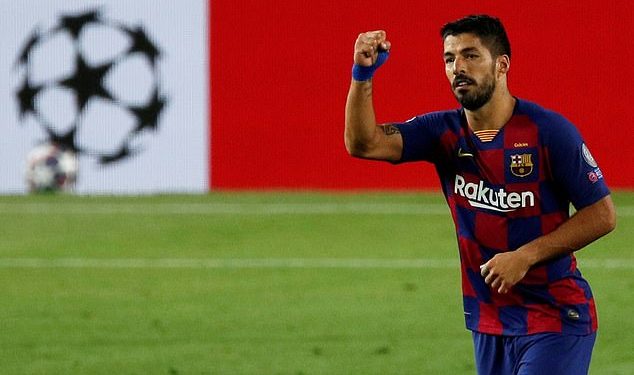 Luis Suarez signs for Atletico Madrid