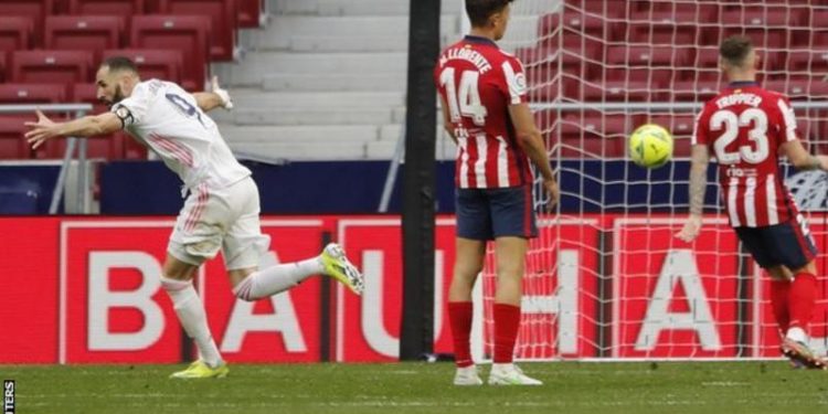 Benzema rescues point for Madrid at leaders Atletico