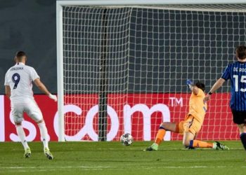 Real Madrid eases into Champions League last eight