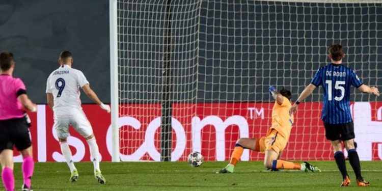 Real Madrid eases into Champions League last eight