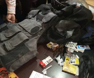 Police officer arrested for stealing AK 47, dead body bag