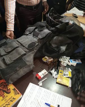 Police officer arrested for stealing AK 47, dead body bag