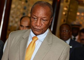 Guinea junta says ex-president at home with his wife