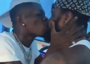 Shatta Wale kissing male bodyguard sparks controversy