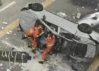 Two killed as Nio electric car falls from third floor office in Shanghai