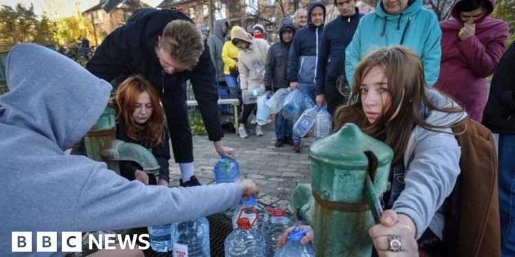 Ukraine war: Kyiv locals queue for water after Russian strikes