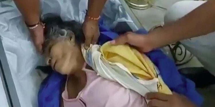 ‘Dead’ woman found breathing in coffin
